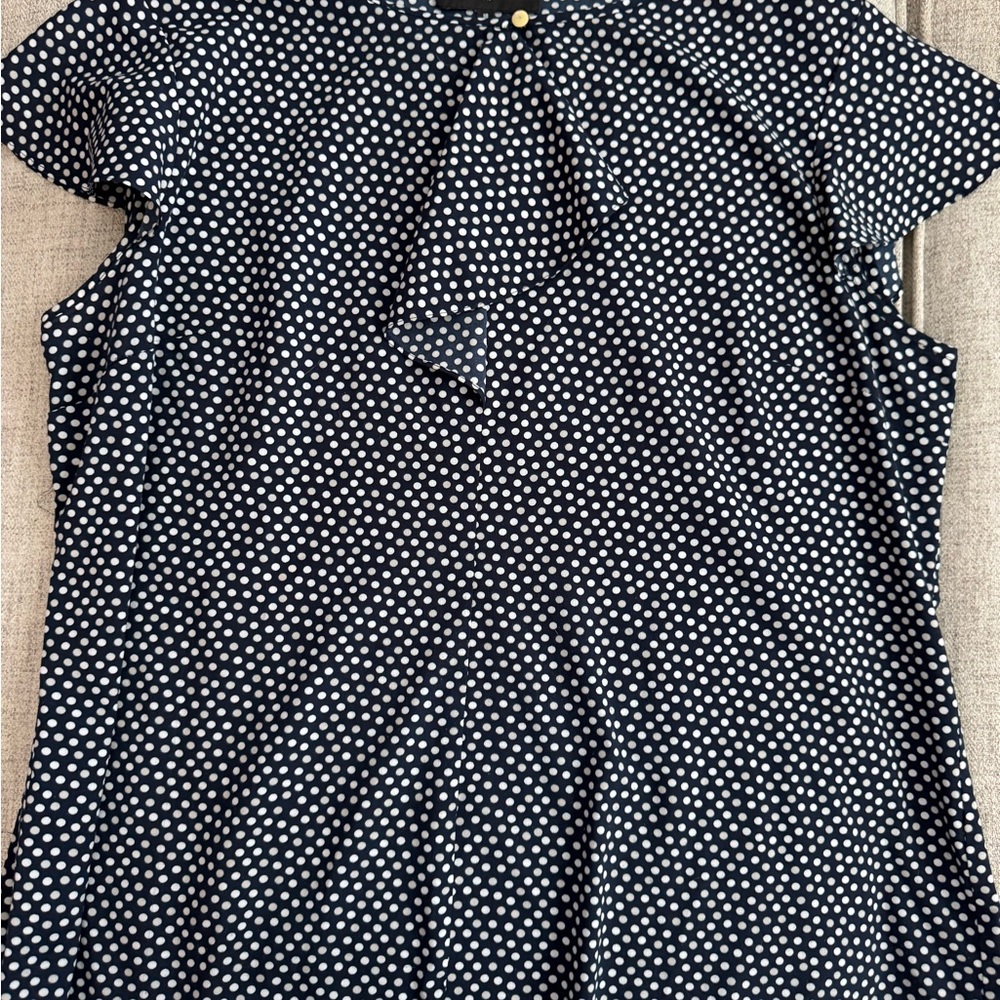 Jones New York Blue Ruffle Front and sleeve blouse with gold button at neck